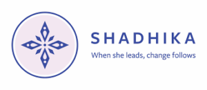 Shadhika's logo, containing the text "when she leads, change follows"